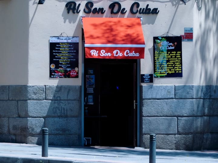 Front of Al Son de Cuba with its red awning